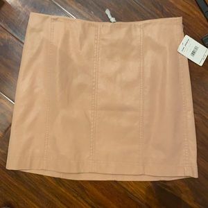 Free people faux leather mini skirt New With Tags in a pretty blush color